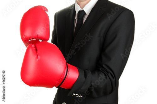 businessman in boxing gloves isolated on white © Africa Studio