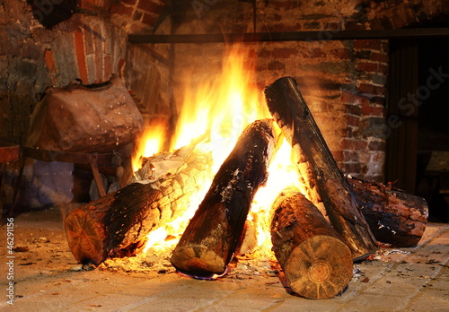 Fireplace with firewoood inside