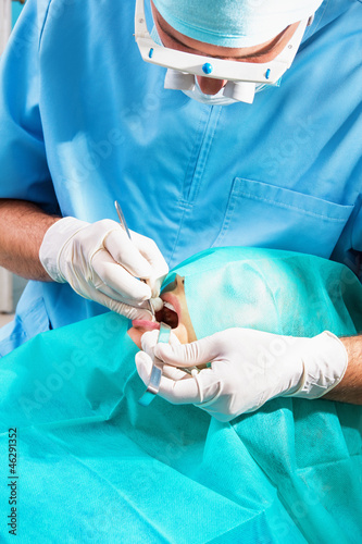 Dentists operate on a tooth