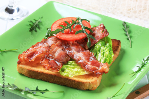 Toast with crispy bacon strips