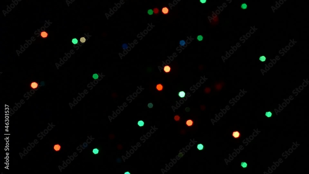 flashing colored lights on a dark background flashing colored lights on a dark background