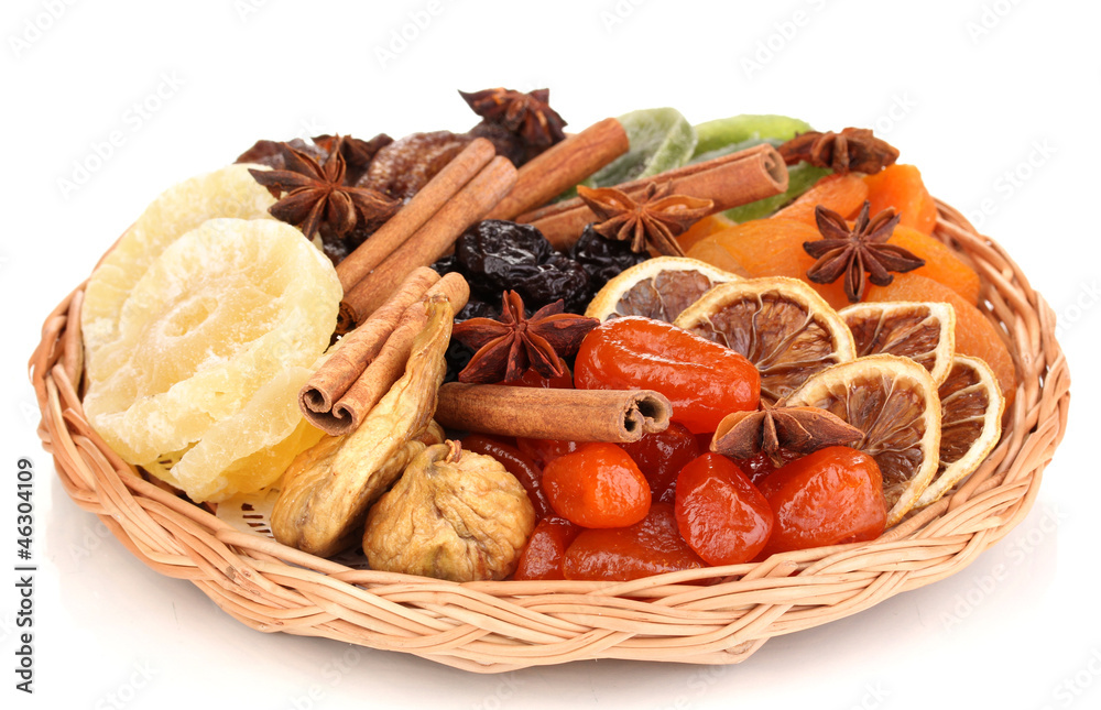 Dried fruits with cinnamon and anise stars isolated on white Dried fruits with cinnamon and anise stars isolated on white