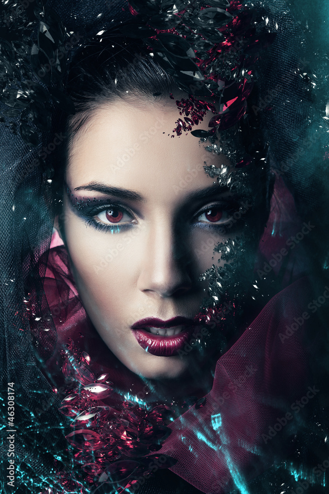 woman in hood with gemstones woman in hood with gemstones