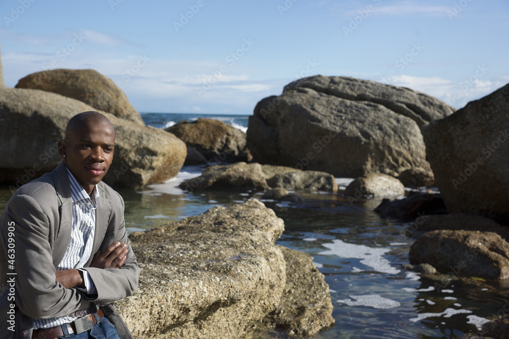 Young African man on the beach