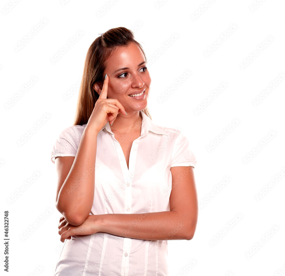 Stylish reflective young woman looking to her left Stylish reflective young woman looking to her left