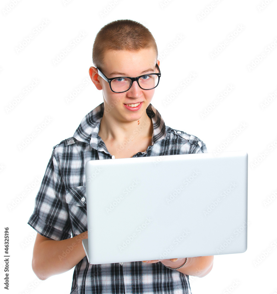 Young boy using a laptop Young boy using a laptop