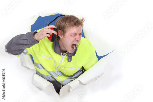 Принти на полотні Men with helmets and unbearable noise