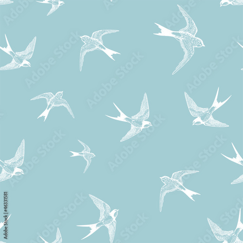 blue seamless pattern with white little swallows