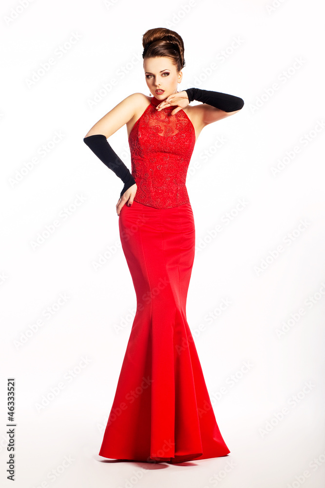 Beauty newlywed in long wedding red dress and fashion gloves