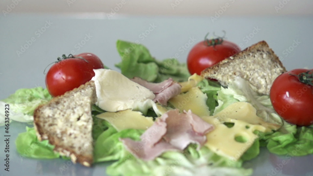 Mozzarella cheese falling on food, slow motion shot at 480fps Mozzarella cheese falling on food, slow motion shot at 480fps