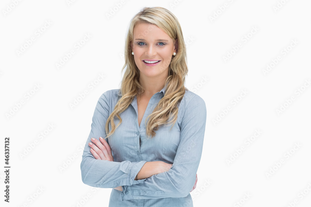 Smiling woman having arms crossed Smiling woman having arms crossed