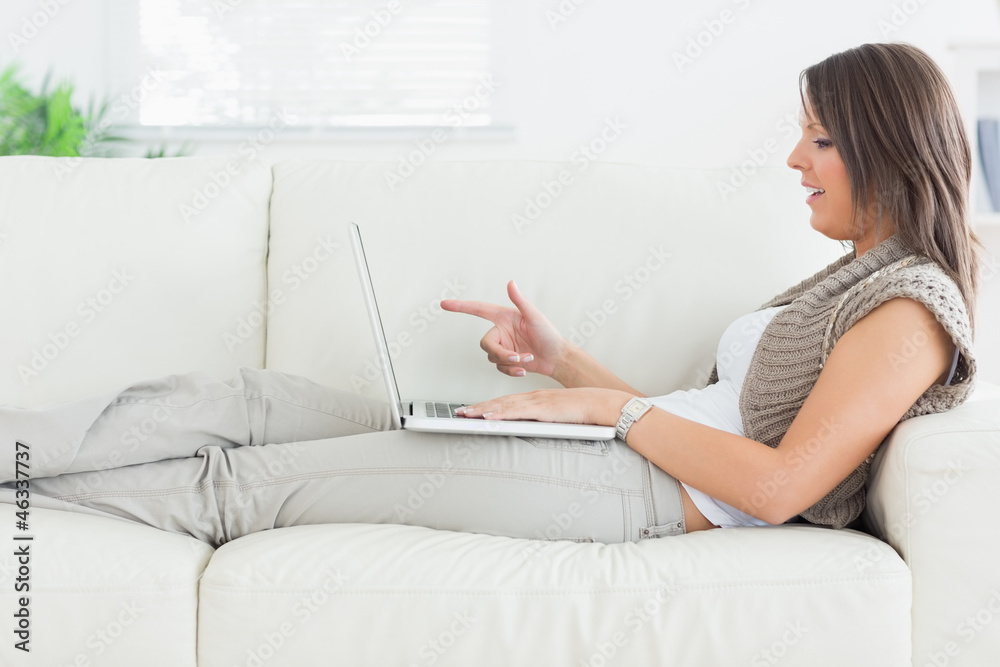 Woman using video chat on laptop Woman using video chat on laptop