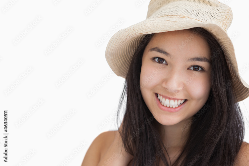 Smiling woman with a straw hat Smiling woman with a straw hat