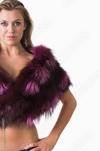 Woman wearing a pink fur stole