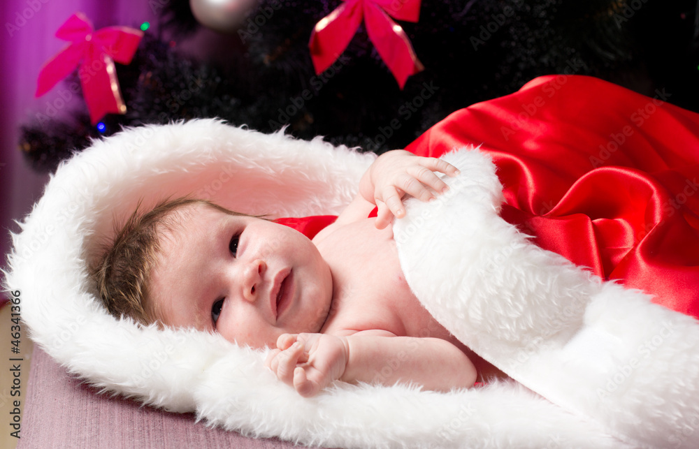 Happy Smiling baby lying on tummy wearing Happy Smiling baby lying on tummy wearing
