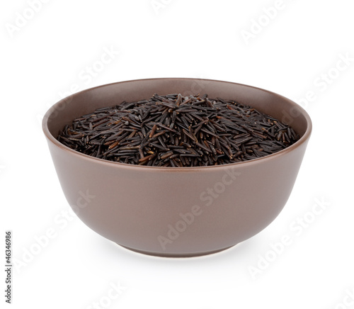 Bowl of healthy wild rice isolated on white background