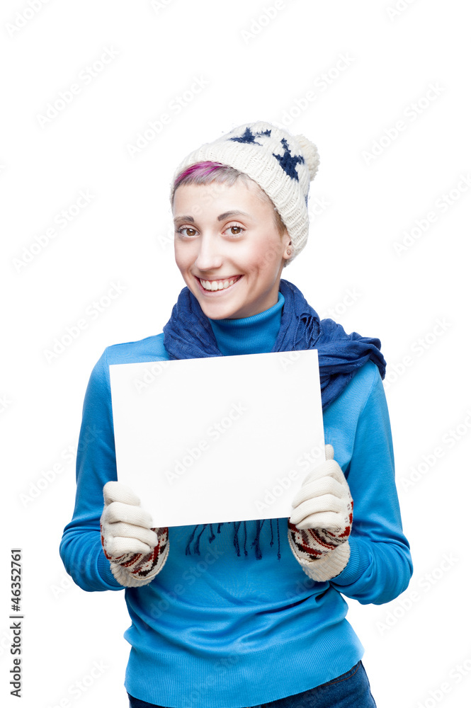 young smiling girl on winter clothing holding sign young smiling girl on winter clothing holding sign
