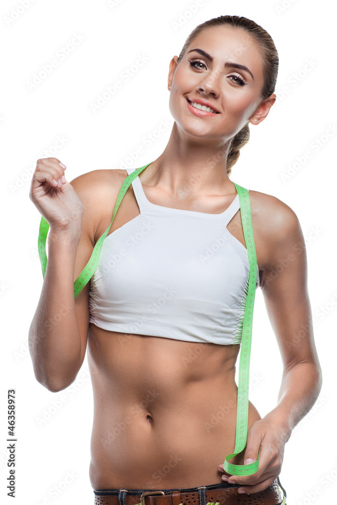 Woman in perfect shape with green measure doing yoga poses. C Woman in perfect shape with green measure doing yoga poses. C