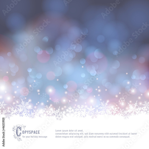 winter background with snow and defocused lights