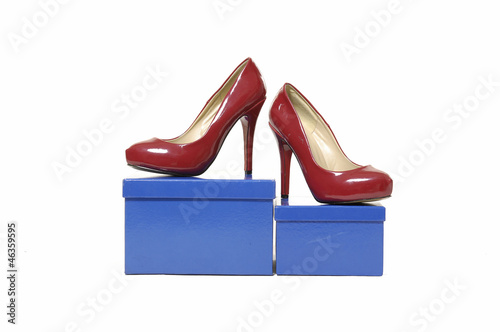 women's shoes on blue box