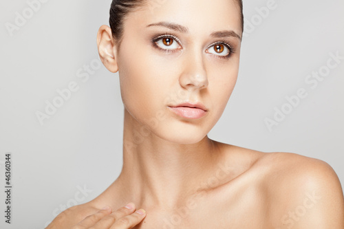 beautiful woman face with clear skin