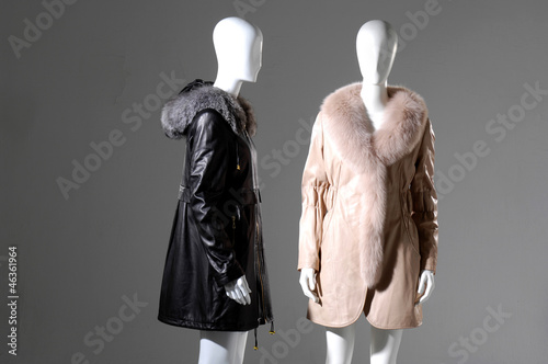 Two Winter coat dress on mannequin