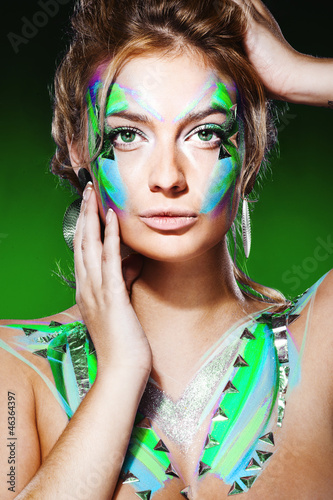 blond woman with colorful makeup