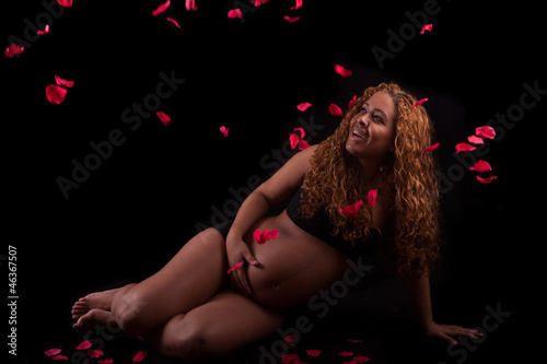 Young beautiful pregnant african woman photo