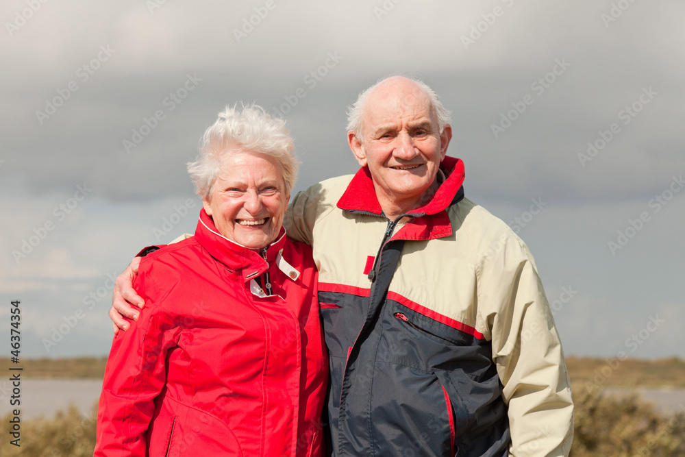 Senior retired couple man and woman enjoying outdoors.