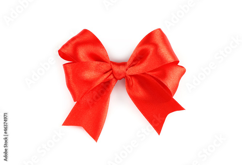 Big red holiday bow on white background