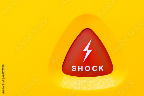 button to apply an AED shock