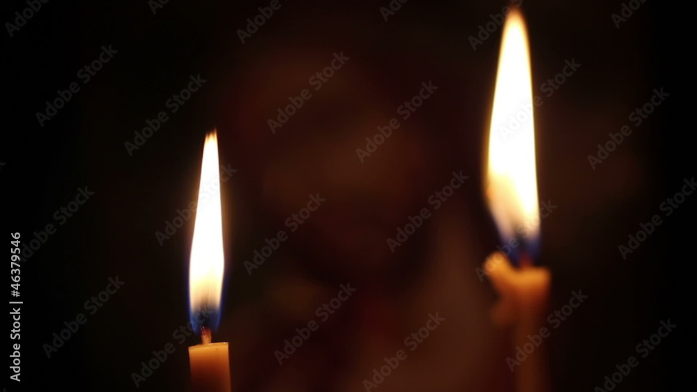 Candles are lit in the church. closeup Candles are lit in the church. closeup