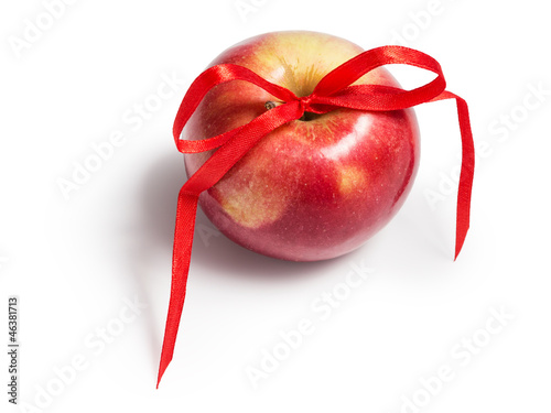 single red apple with ribbon bow