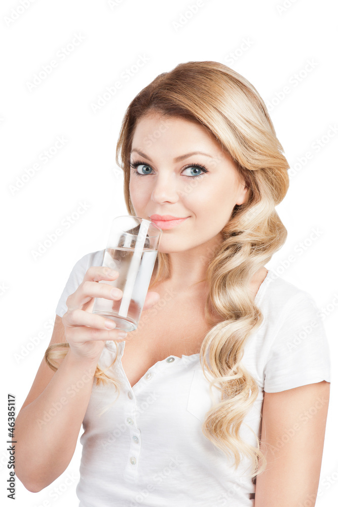 woman in white T-short is holding a glass of water woman in white T-short is holding a glass of water