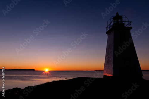 Lighthouse during sunrise in the early morning