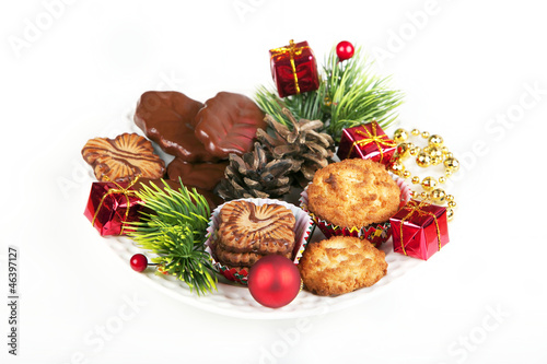 pile of various cookies and christmas decorations