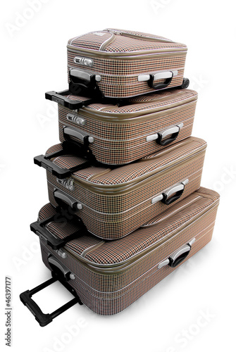Four - travel suitcases (trolley) isolated