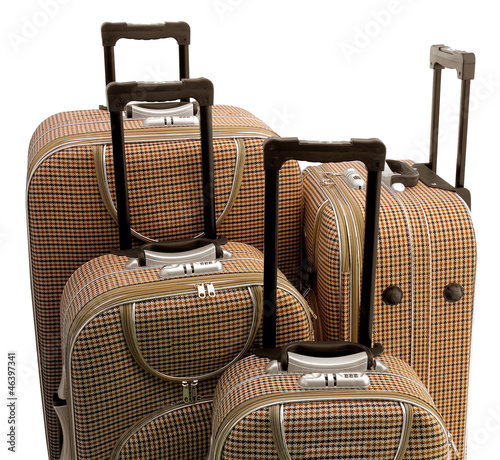 Four - travel suitcases (trolley) isolated