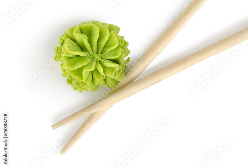 Fototapeta Wooden chopsticks and wasabi isolated