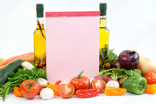 Fototapeta Naklejka Na Ścianę i Meble -  Paper for recipes with vegetable oil, tomatoes, garlic