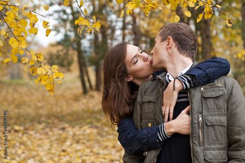 young girl and boy kissing