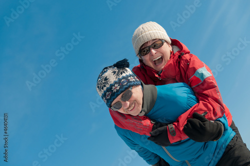 Winter fun - happy senior couple