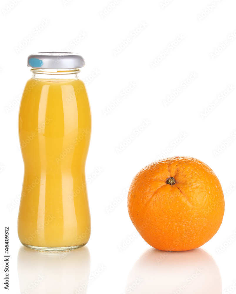 Delicious orange juice in a bottle and orange next to it Delicious orange juice in a bottle and orange next to it