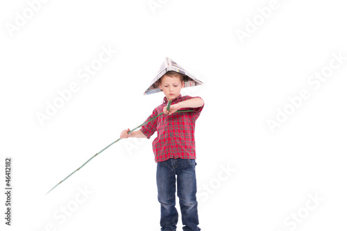 Junge mit Zollstock in der Hand photo