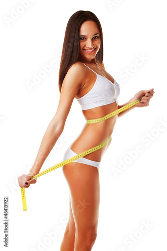 Yellow measure on woman body © alexbutscom