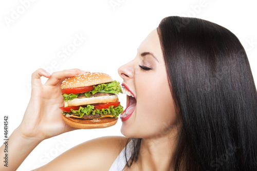 girl biting hamburger