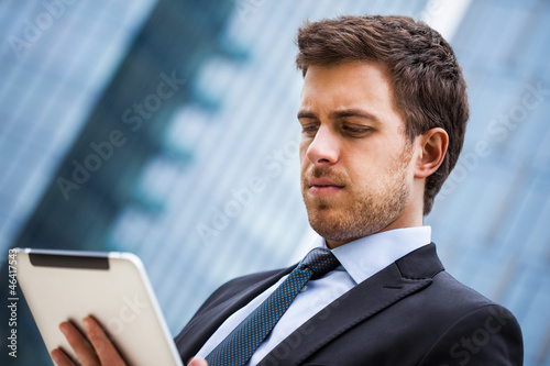 Businessman using a tablet photo