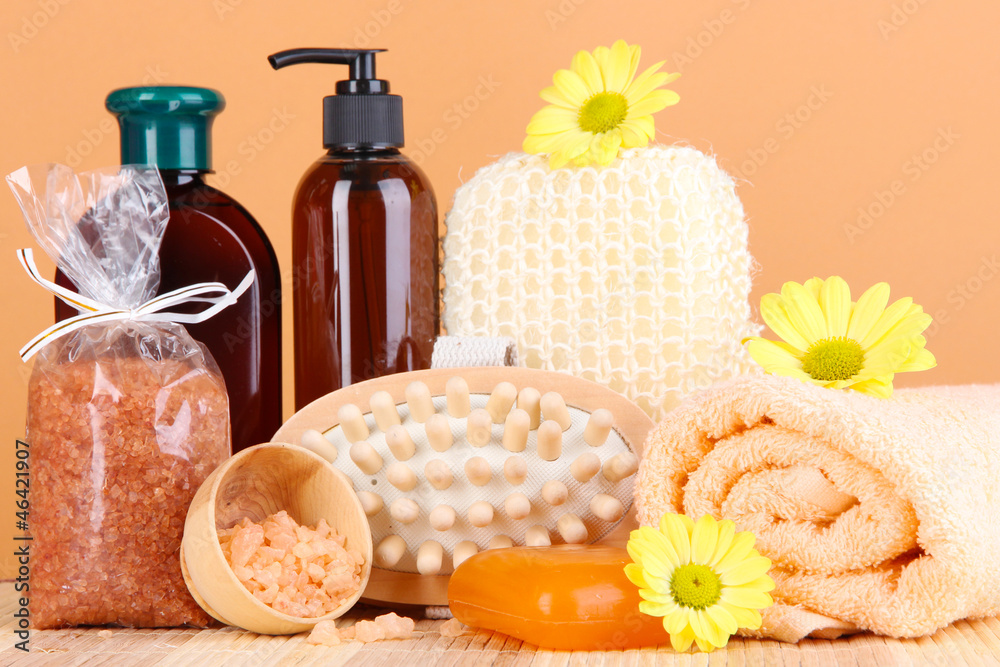 Set for care of a body on peach background Set for care of a body on peach background