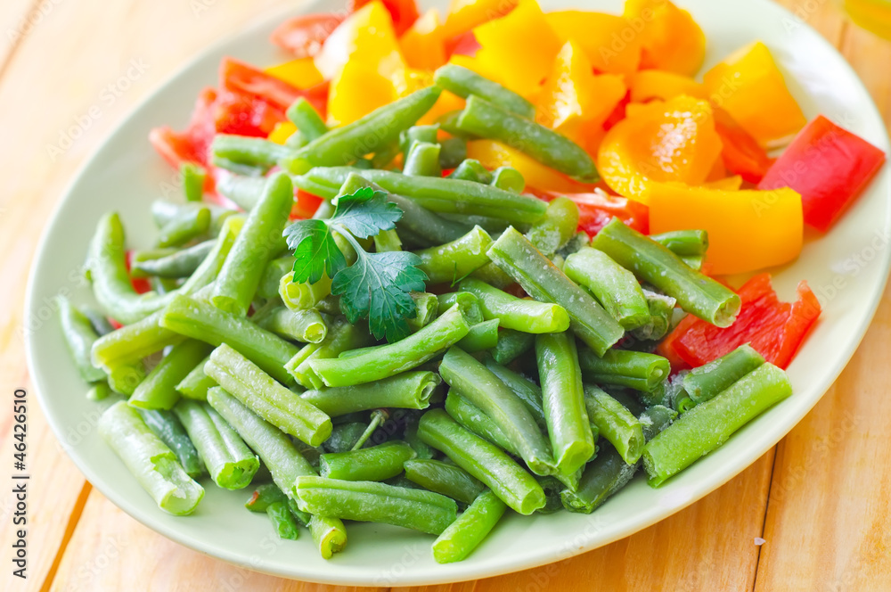 Fresh raw vegetables in the green plate Fresh raw vegetables in the green plate