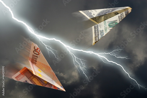 business concept. euro and dollar plane and  thunderstorm